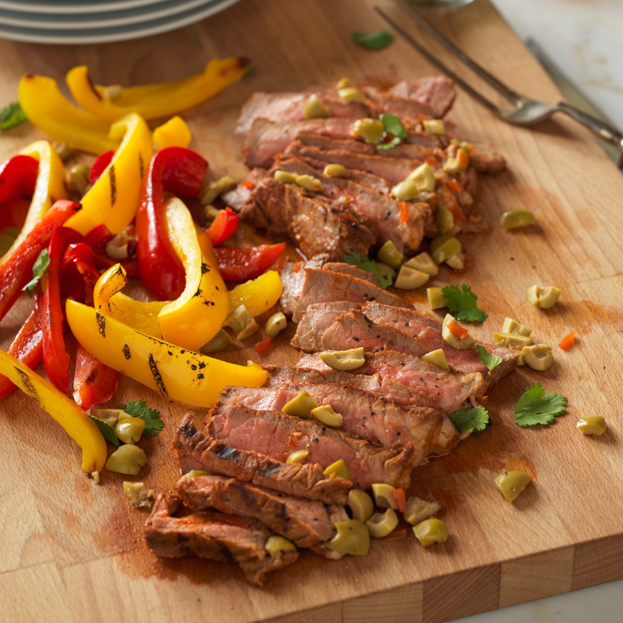 Spanish-Style Grilled Steaks with Olives : Strauss Brands